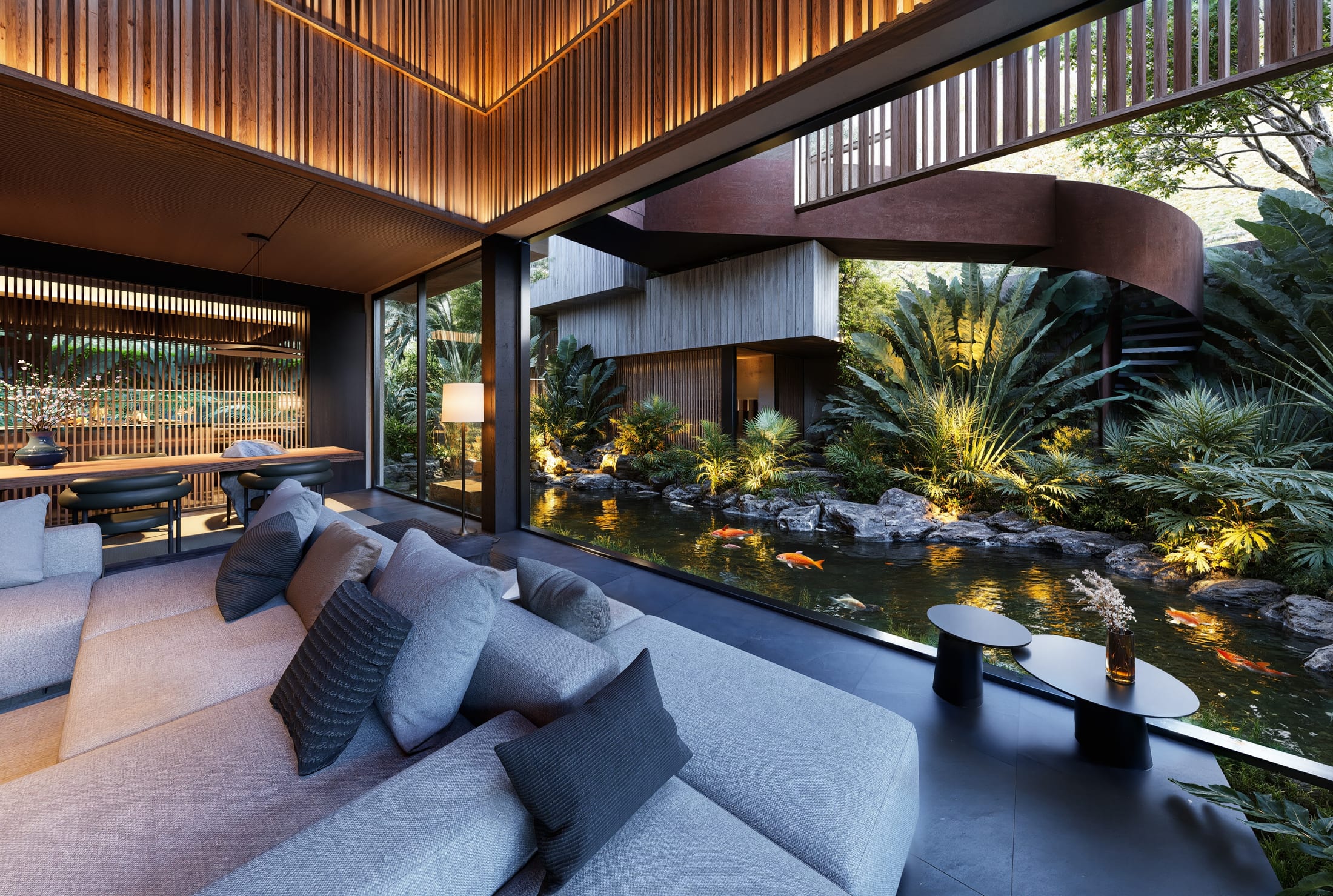 Sofa phòng khách nhìn thẳng ra hồ cá koi qua vách kính, Āśraya