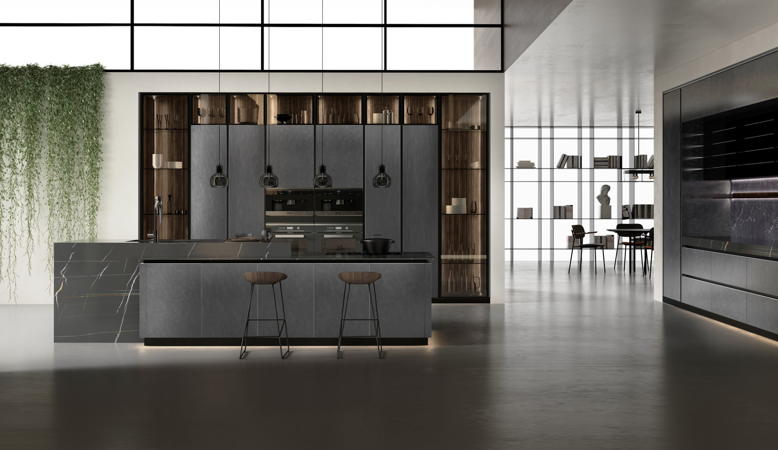 Đảo bếp Golden Home mặt đá tối với ghế bar trong không gian loft mở có cây xanh rủ